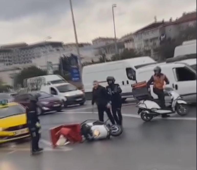 Maltepe'de otomobil sürücüsü motosikletli kuryeye demir çubukla saldırı